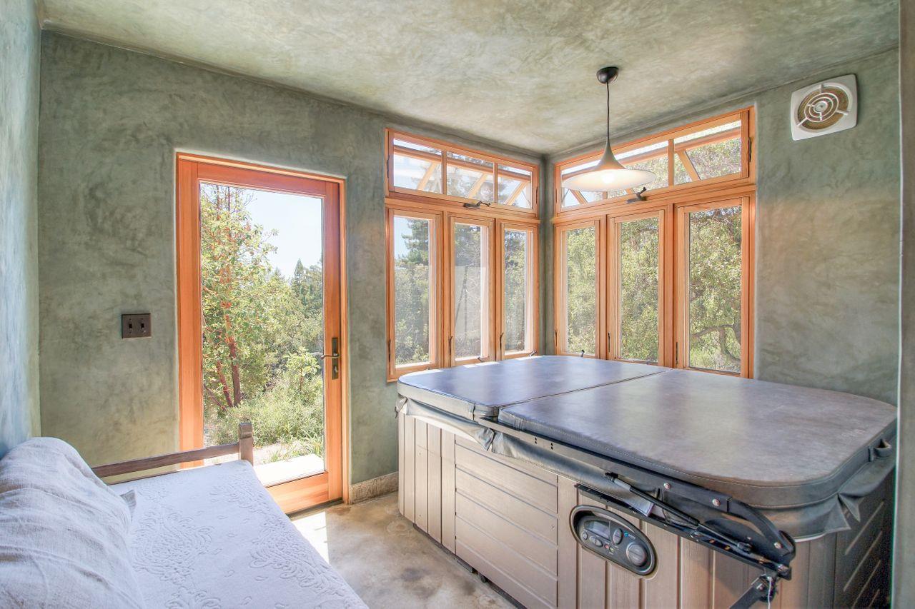 1069 Summit Road Watsonville, CA 95076 - Photo 24 of 50 a living room with stainless steel appliances granite countertop a stove top oven