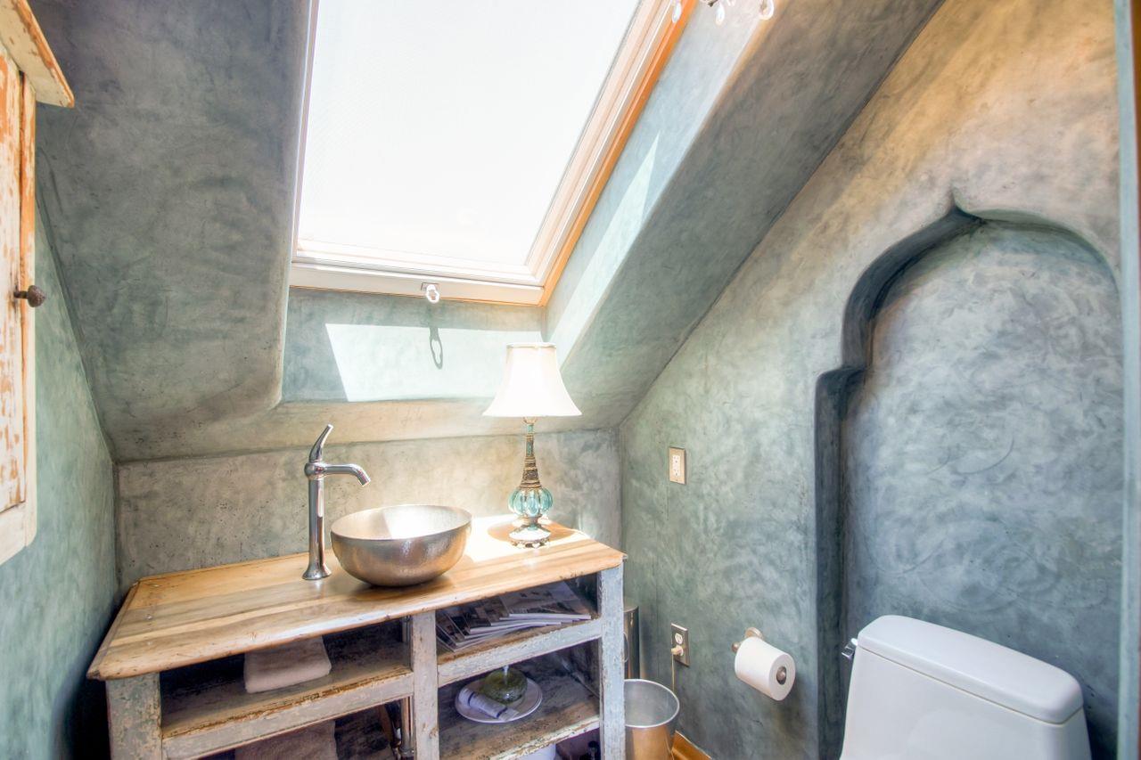 1069 Summit Road Watsonville, CA 95076 - Photo 31 of 50 a bathroom with a sink and a toilet