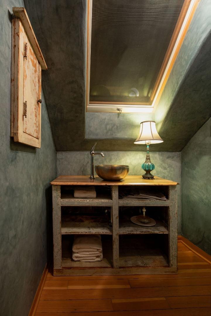 1069 Summit Road Watsonville, CA 95076 - Photo 32 of 50 a bathroom with a sink and a mirror
