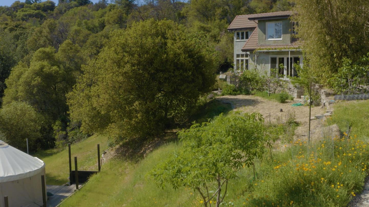 1069 Summit Road Watsonville, CA 95076 - Photo 4 of 50 a view of a brick house with a yard