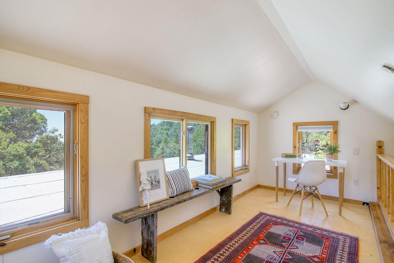 1069 Summit Road Watsonville, CA 95076 - Photo 50 of 50 a living room with furniture and a large window