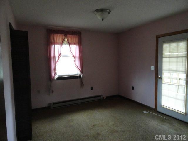 1420 Barger Road Salisbury, NC 28146 - Photo 3 of 7 an empty room with a window