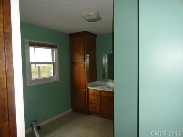 1420 Barger Road Salisbury, NC 28146 - Photo 5 of 7 a room with window and closet