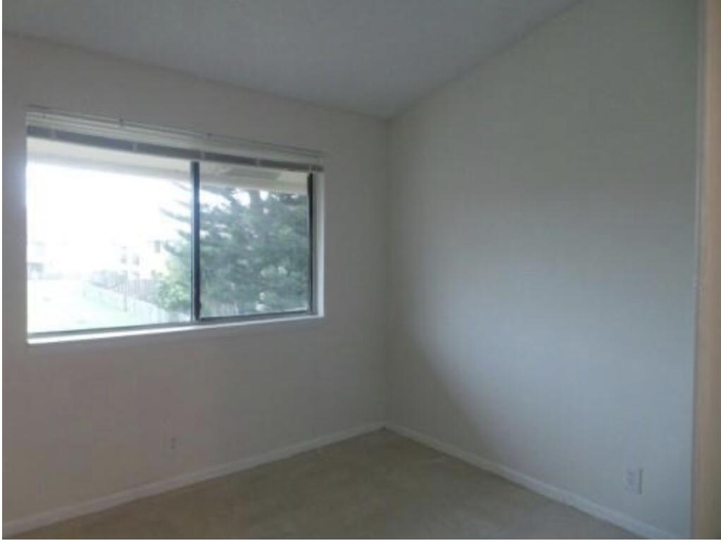 200 Nottingham Circle, Unit J Greenacres, FL 33463 - Photo 10 of 12 a small space with a window