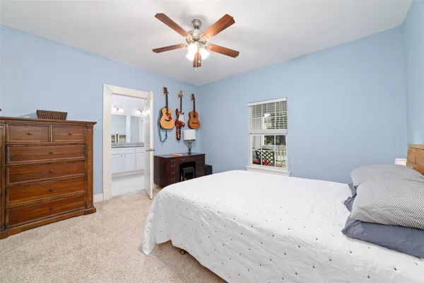 a bedroom with a bed and a closet