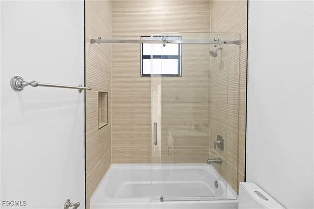 a bathroom with a bath tub