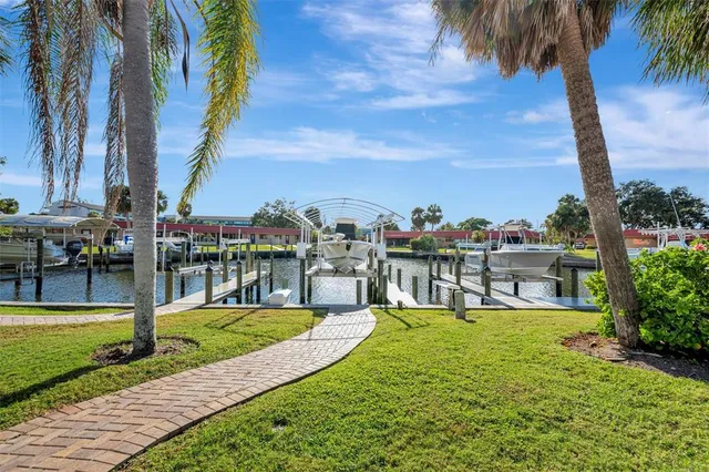 a bathroom with a toilet sink and shower