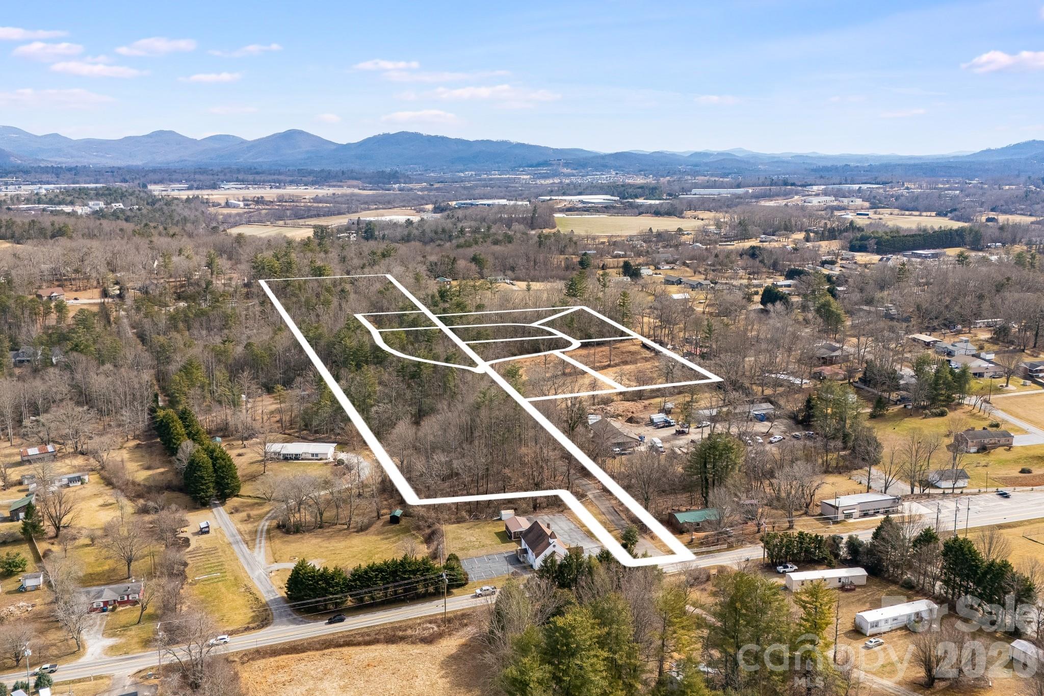 0 Old Haywood Road Mills River, NC 28759 - Photo 3 of 16 a view of a city with mountain