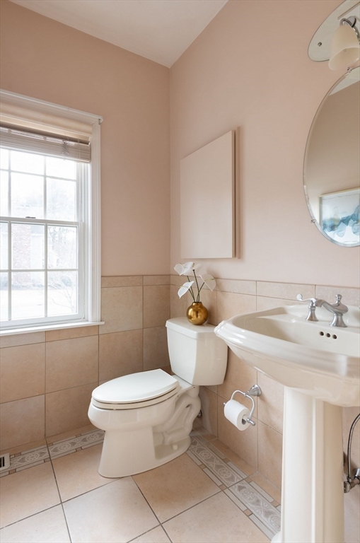 21 Bryant Road Lexington, MA 02420 - Photo 18 of 33 a bathroom with a toilet sink and mirror