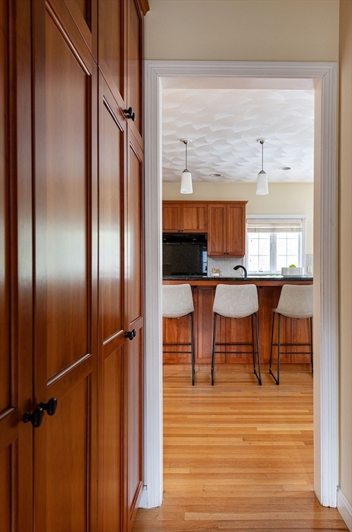 21 Bryant Road Lexington, MA 02420 - Photo 19 of 33 a view of a kitchen from the hallway
