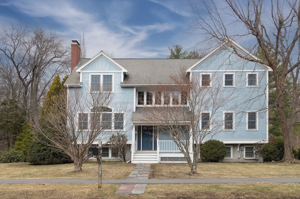 21 Bryant Road Lexington, MA 02420 - Photo 2 of 33 a front view of a house with a yard