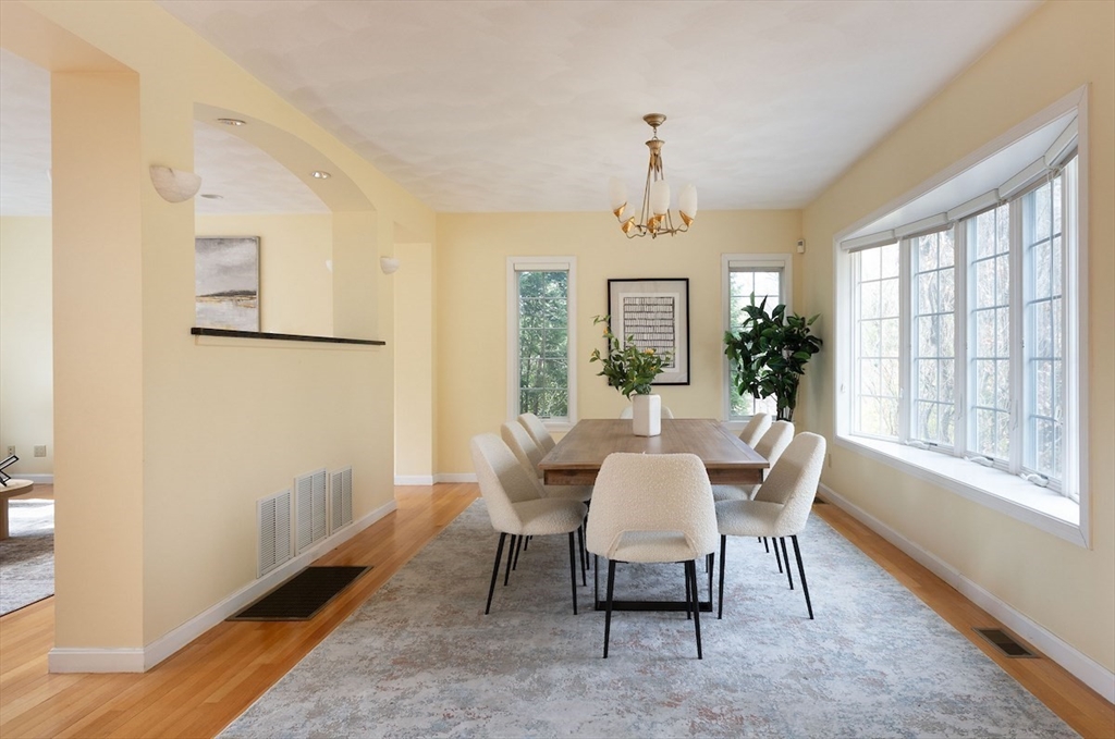 21 Bryant Road Lexington, MA 02420 - Photo 9 of 33 a view of a dining room with furniture window and outside view