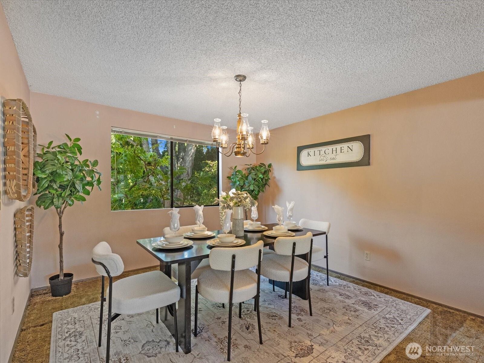 12314 Northeast 162nd Street Bothell, WA 98011 - Photo 16 of 39 a view of a dining room with furniture window and outside view