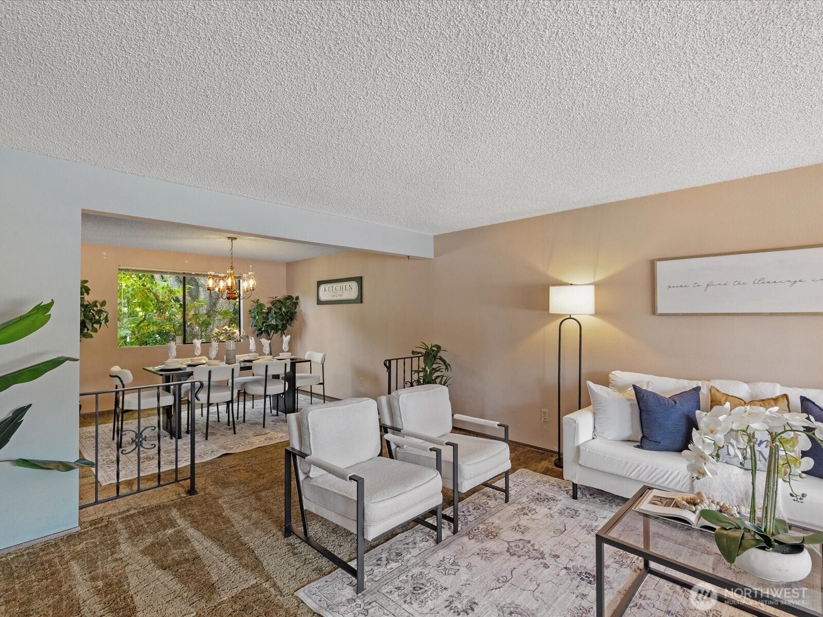 12314 Northeast 162nd Street Bothell, WA 98011 - Photo 17 of 39 a living room with furniture and a large window