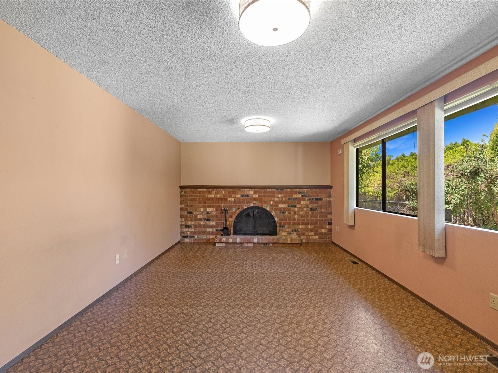 12314 Northeast 162nd Street Bothell, WA 98011 - Photo 20 of 39 an empty room with windows