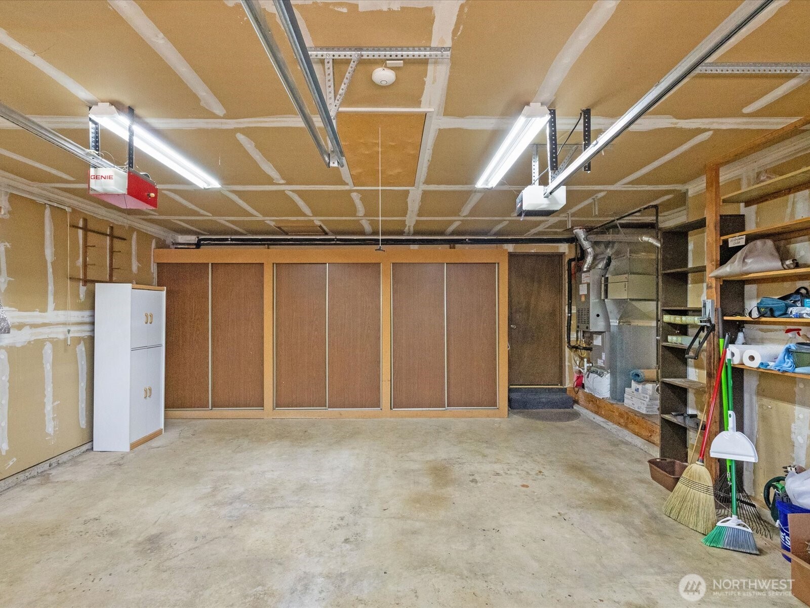 12314 Northeast 162nd Street Bothell, WA 98011 - Photo 22 of 39 a view of an empty room with storage