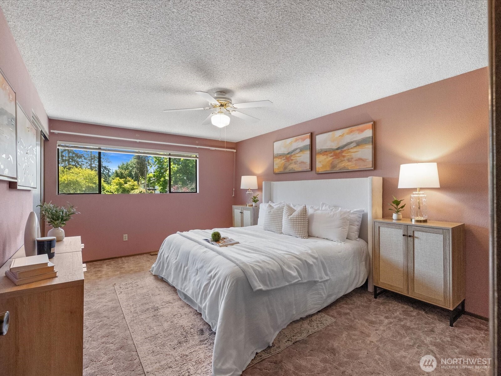 12314 Northeast 162nd Street Bothell, WA 98011 - Photo 23 of 39 a bedroom with a large bed and windows