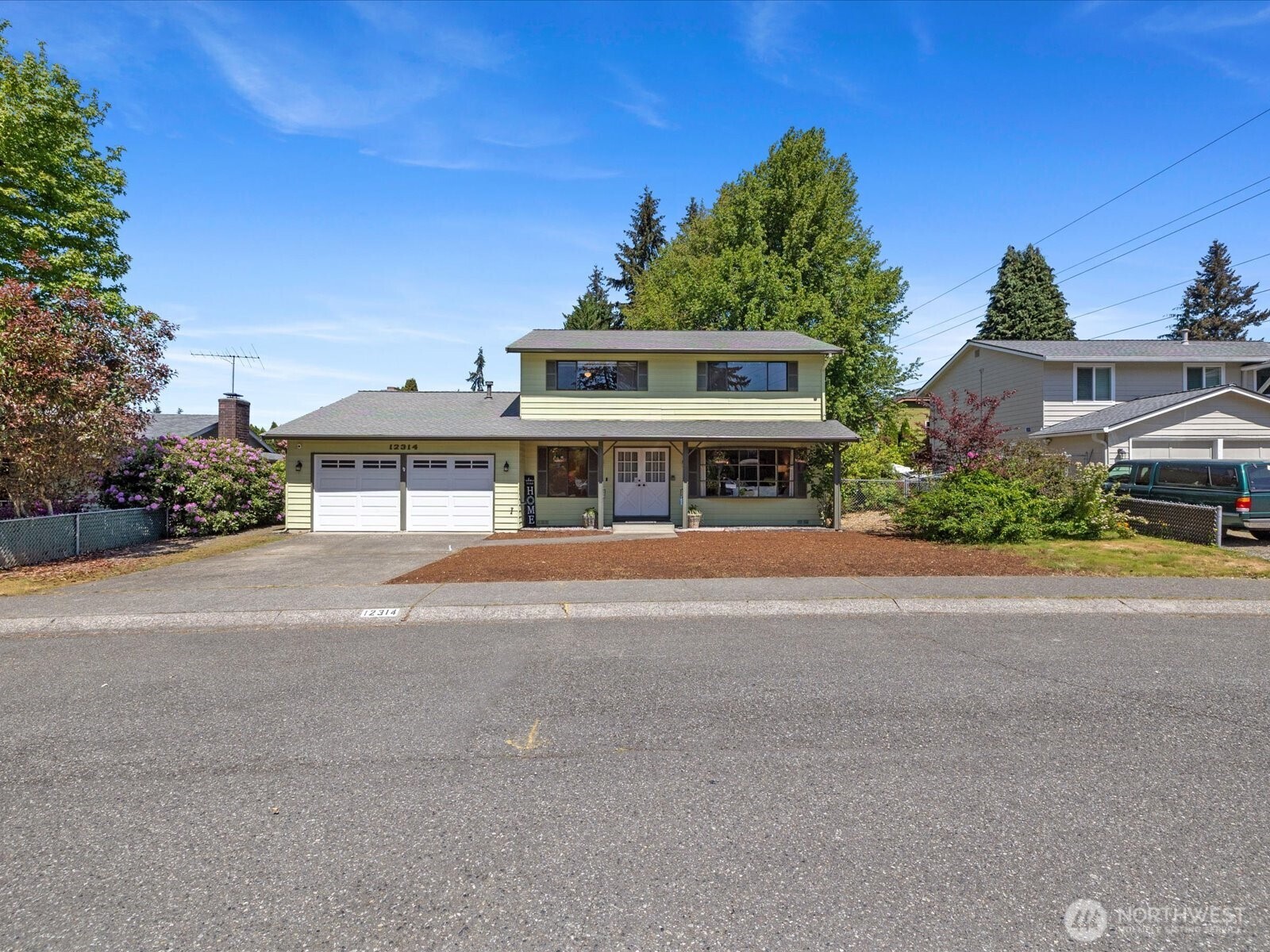 12314 Northeast 162nd Street Bothell, WA 98011 - Photo 3 of 39 a view of house with a street