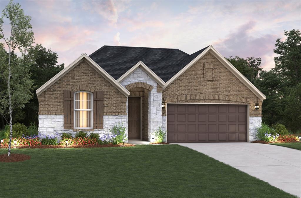 1617 Willow Oak Way Pearland, TX 77581 - Photo 1 of 6 a front view of a house with a garden and plants