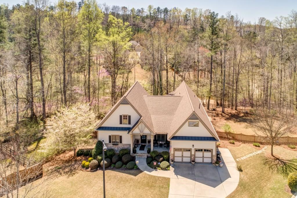 249 Cedar Ridge Way. Dallas, GA 30157 - Photo 1 of 1 Large Private Lot! 4 bdrm/3 full bath, Finished terrace level, hot tub overlooking private professionally landscaped backyard with creek.