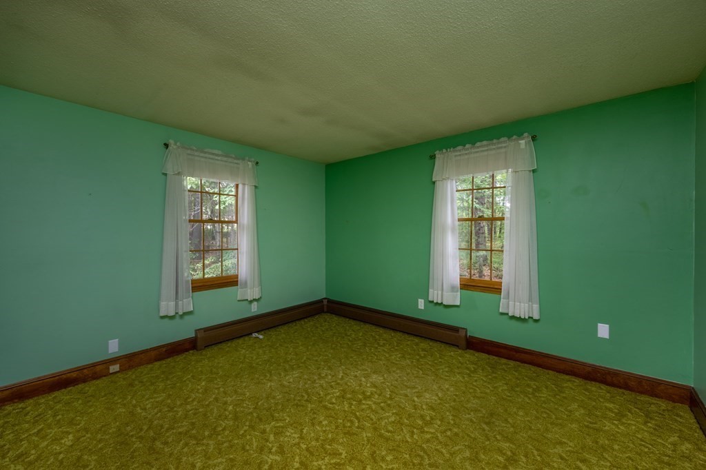 658 Middle Road Acushnet, MA 02743 - Photo 11 of 32 a view of an empty room with a window