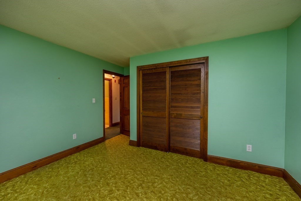 658 Middle Road Acushnet, MA 02743 - Photo 12 of 32 an empty room with closet