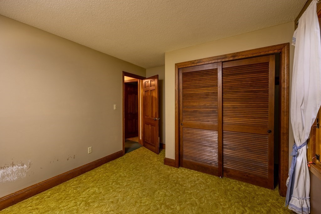 658 Middle Road Acushnet, MA 02743 - Photo 14 of 32 a view of room with walk in closet