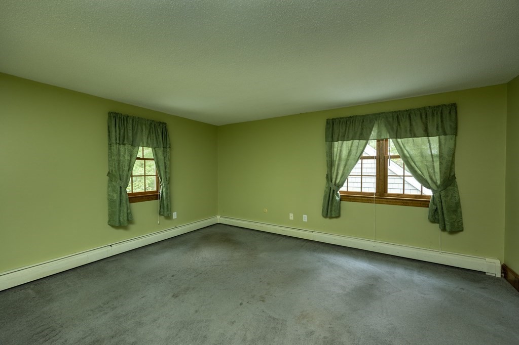 658 Middle Road Acushnet, MA 02743 - Photo 15 of 32 an empty room with windows