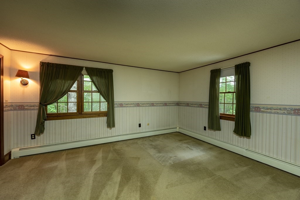 658 Middle Road Acushnet, MA 02743 - Photo 17 of 32 an empty room with windows