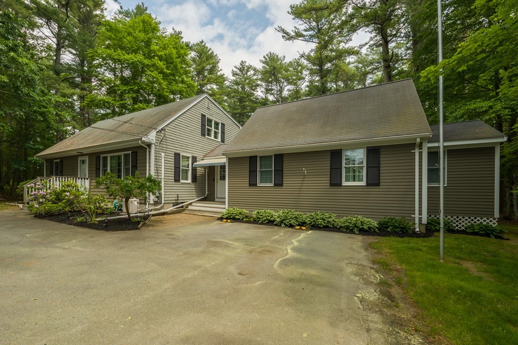 658 Middle Road Acushnet, MA 02743 - Photo 2 of 32 front view of a house with a yard