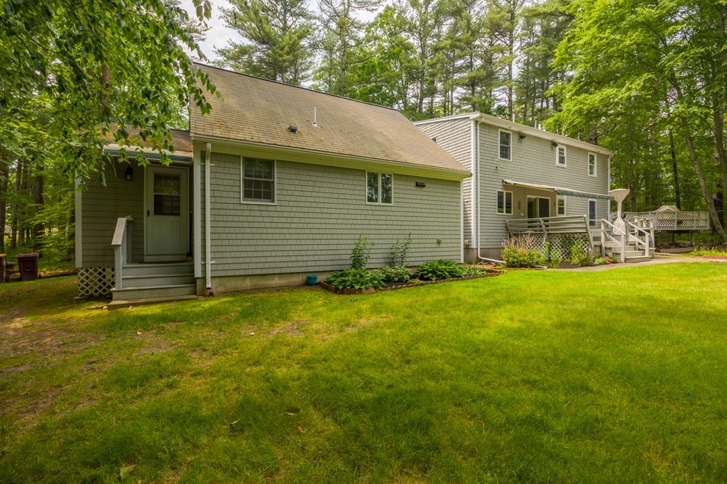 658 Middle Road Acushnet, MA 02743 - Photo 3 of 32 a view of a house with a yard