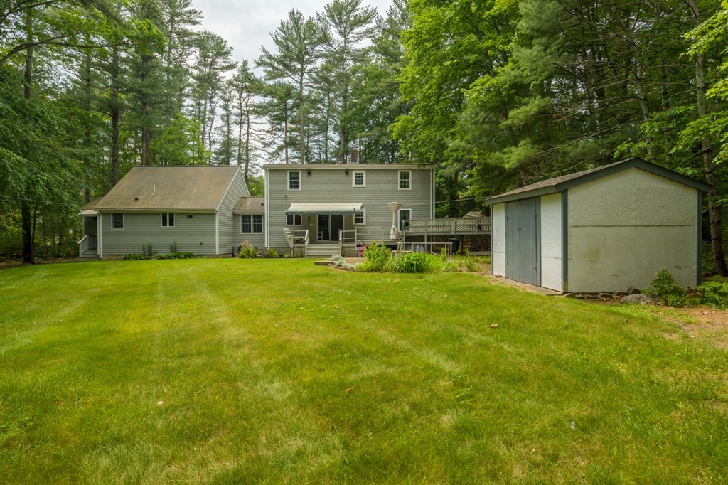 658 Middle Road Acushnet, MA 02743 - Photo 5 of 32 a view of a house with a big yard and large tree