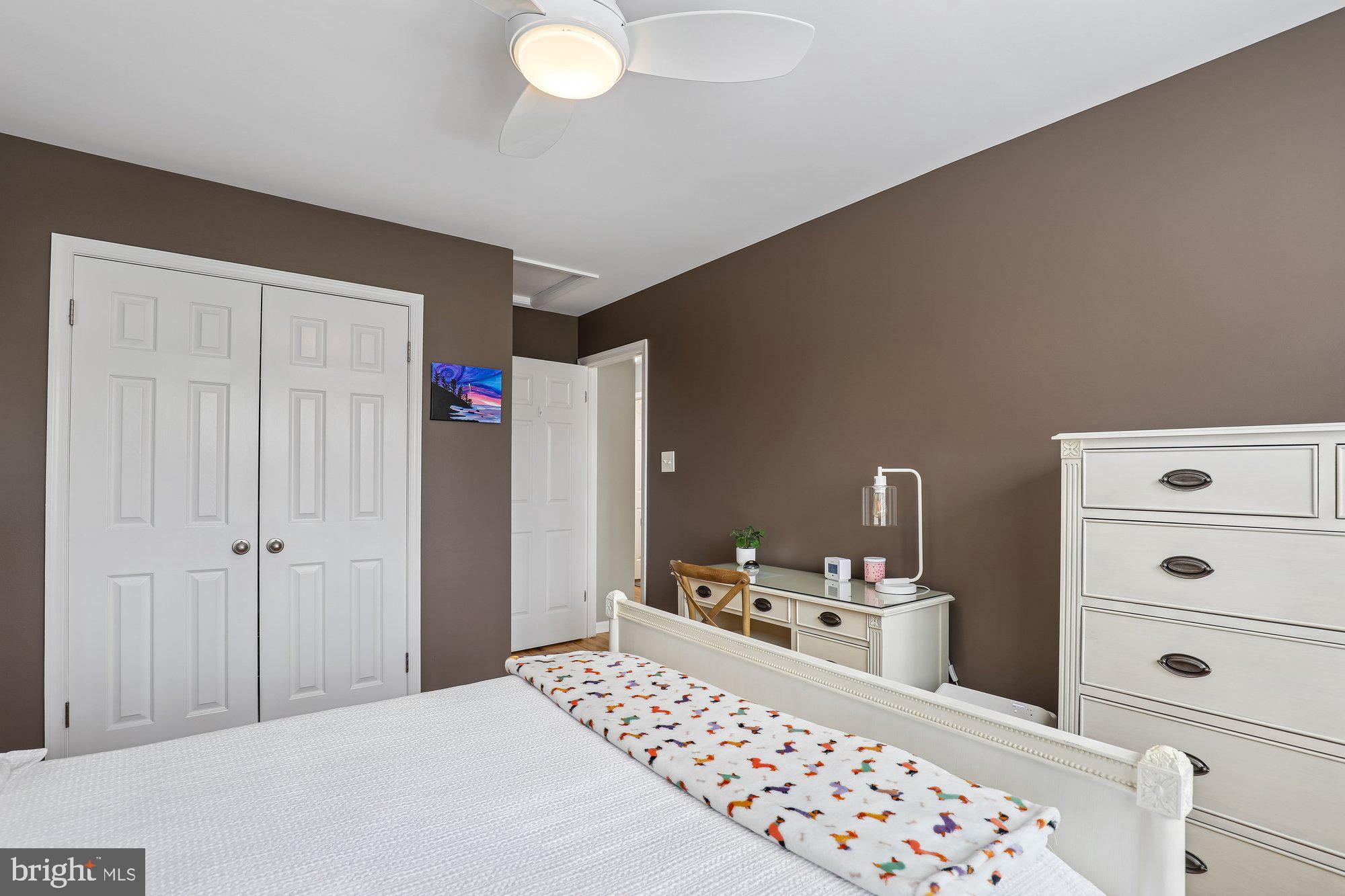 8019 Galla Knoll Circle Springfield, VA 22153 - Photo 34 of 57 a bedroom with a bed and cabinets