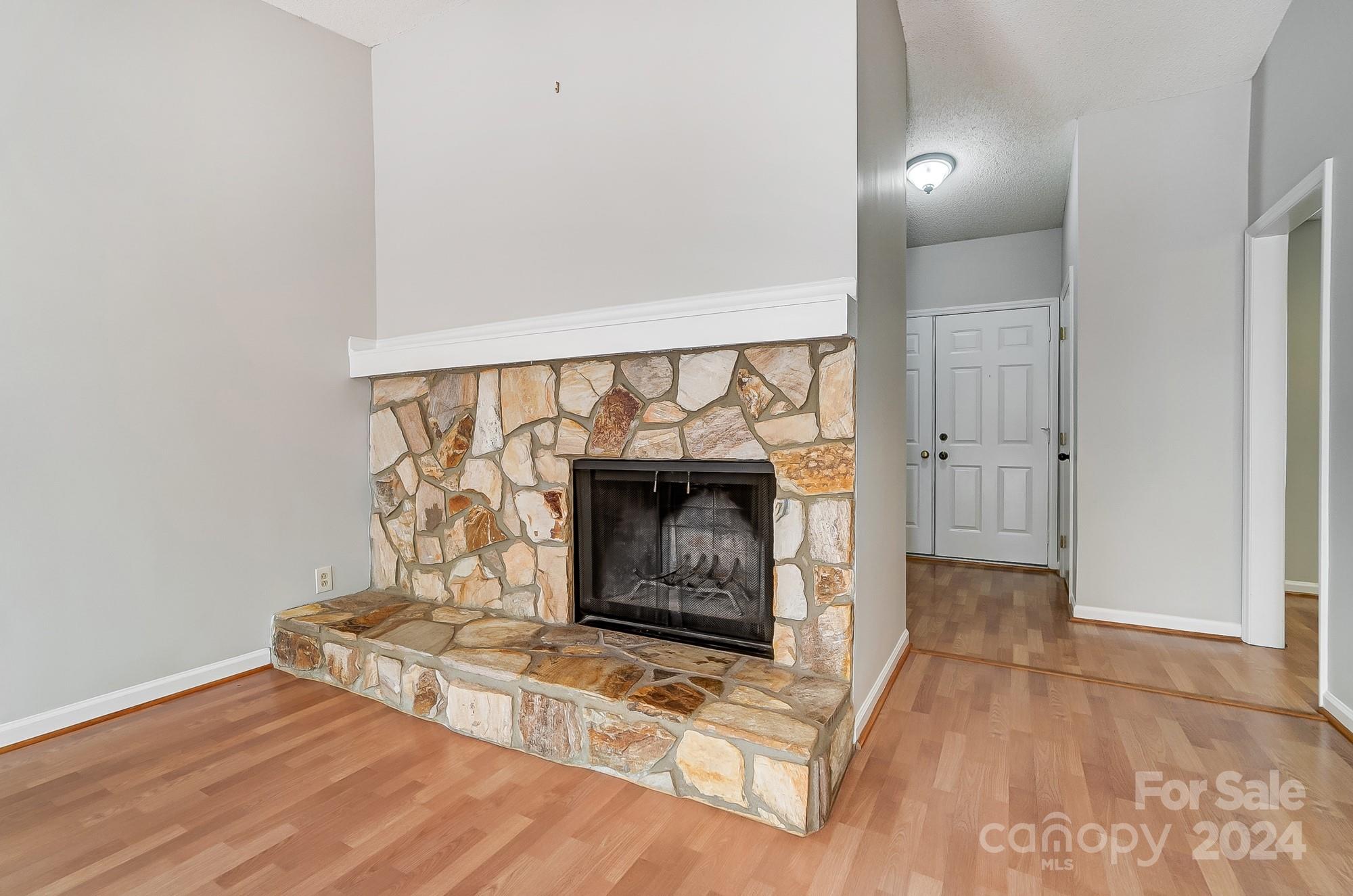 6510 Patchwork Circle Charlotte, NC 28270 - Photo 11 of 48 a living room with a fireplace