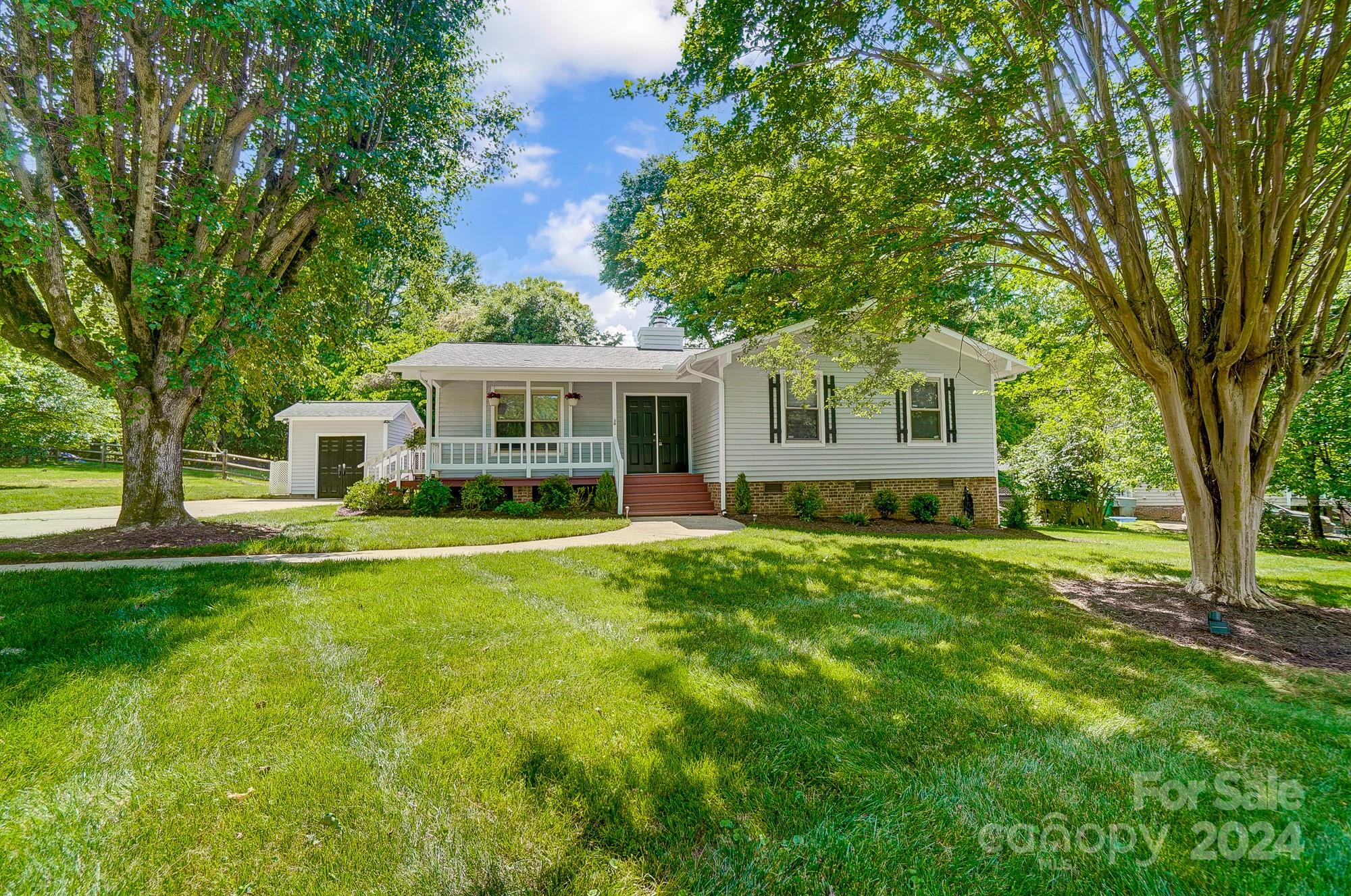 6510 Patchwork Circle Charlotte, NC 28270 - Photo 2 of 48 a view of house with backyard and a garden