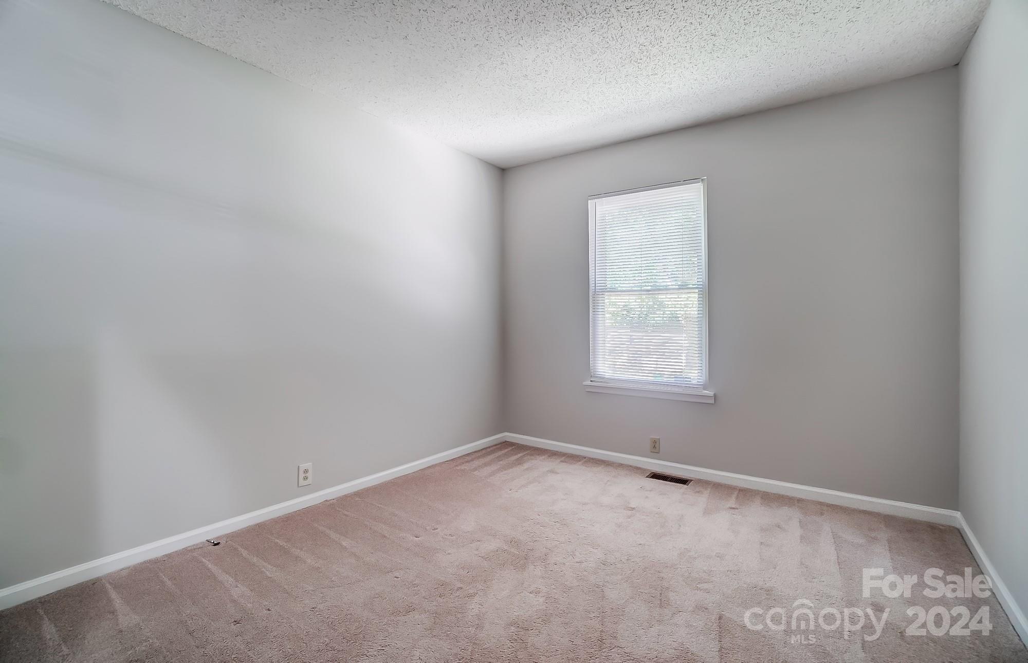 6510 Patchwork Circle Charlotte, NC 28270 - Photo 32 of 48 an empty room with a window