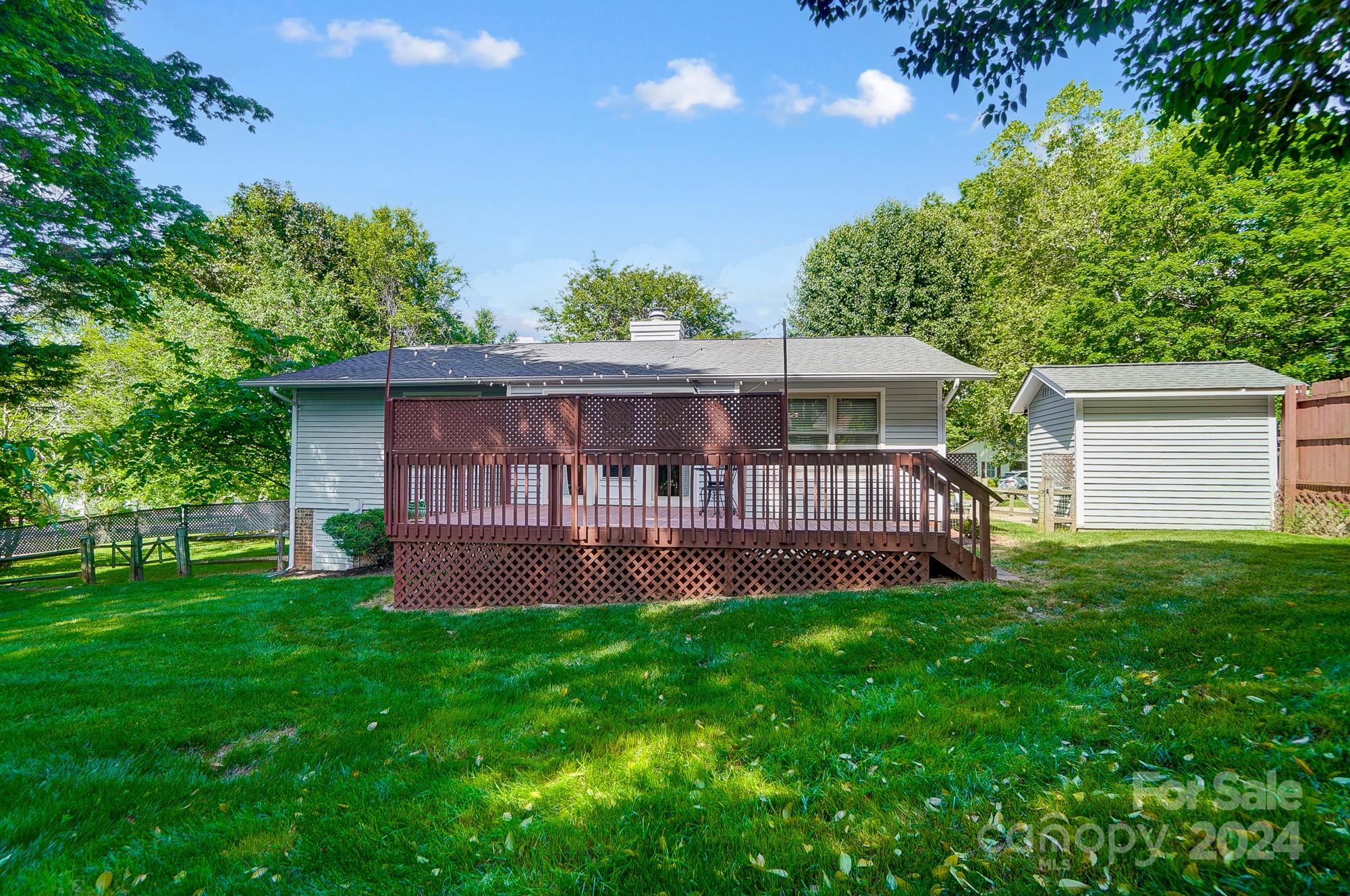 6510 Patchwork Circle Charlotte, NC 28270 - Photo 35 of 48 a view of a house with a yard and a deck
