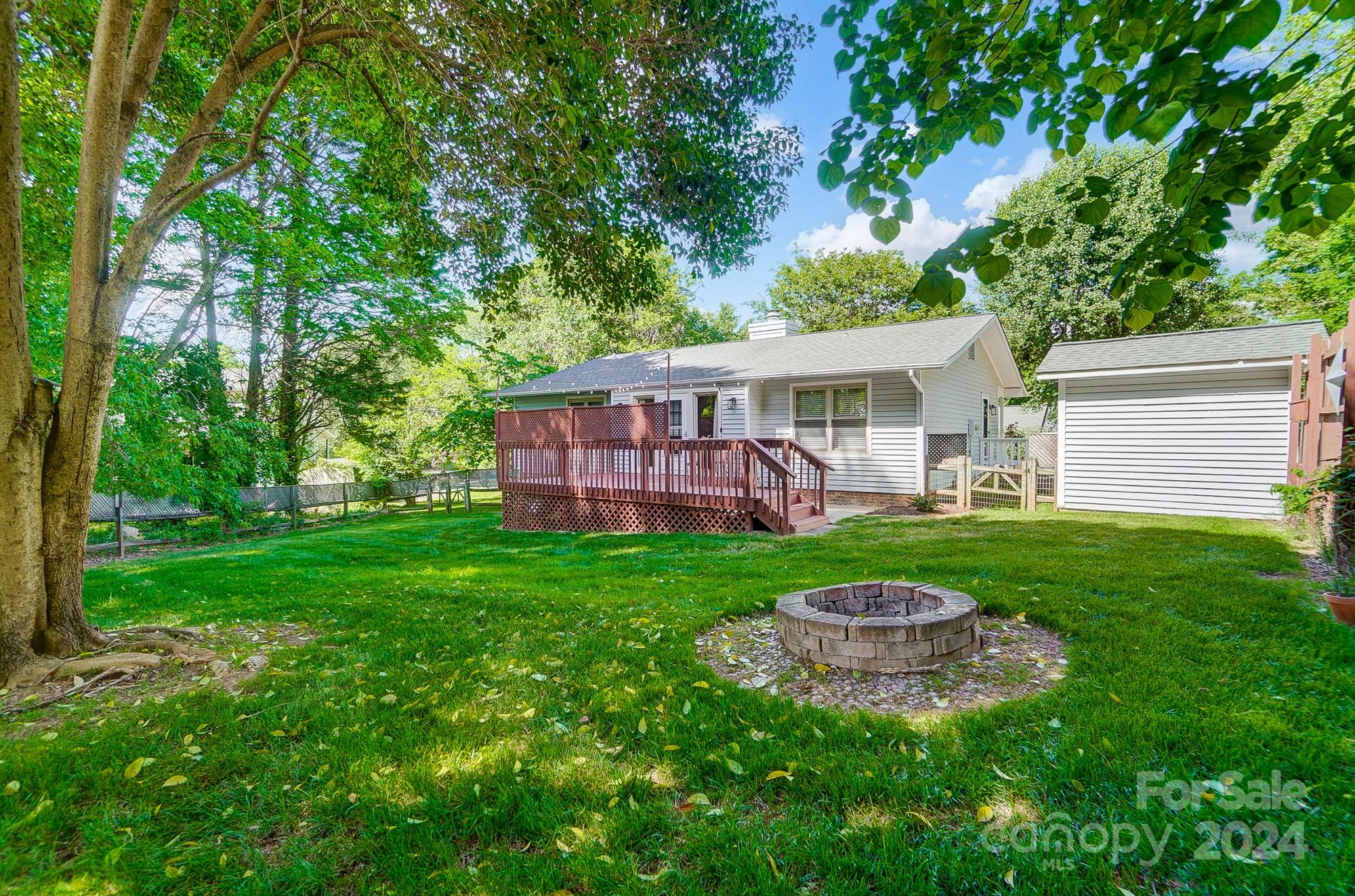 6510 Patchwork Circle Charlotte, NC 28270 - Photo 36 of 48 a view of a house with a backyard and a patio