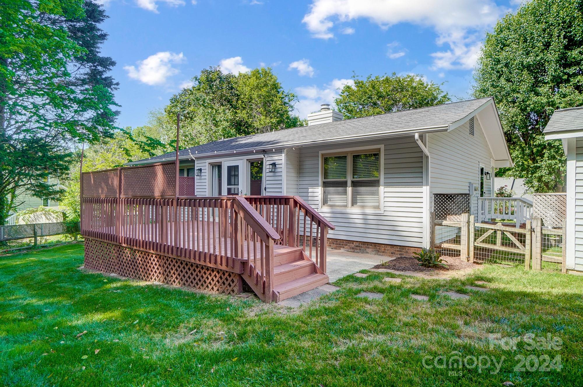 6510 Patchwork Circle Charlotte, NC 28270 - Photo 37 of 48 a view of backyard with deck and garden