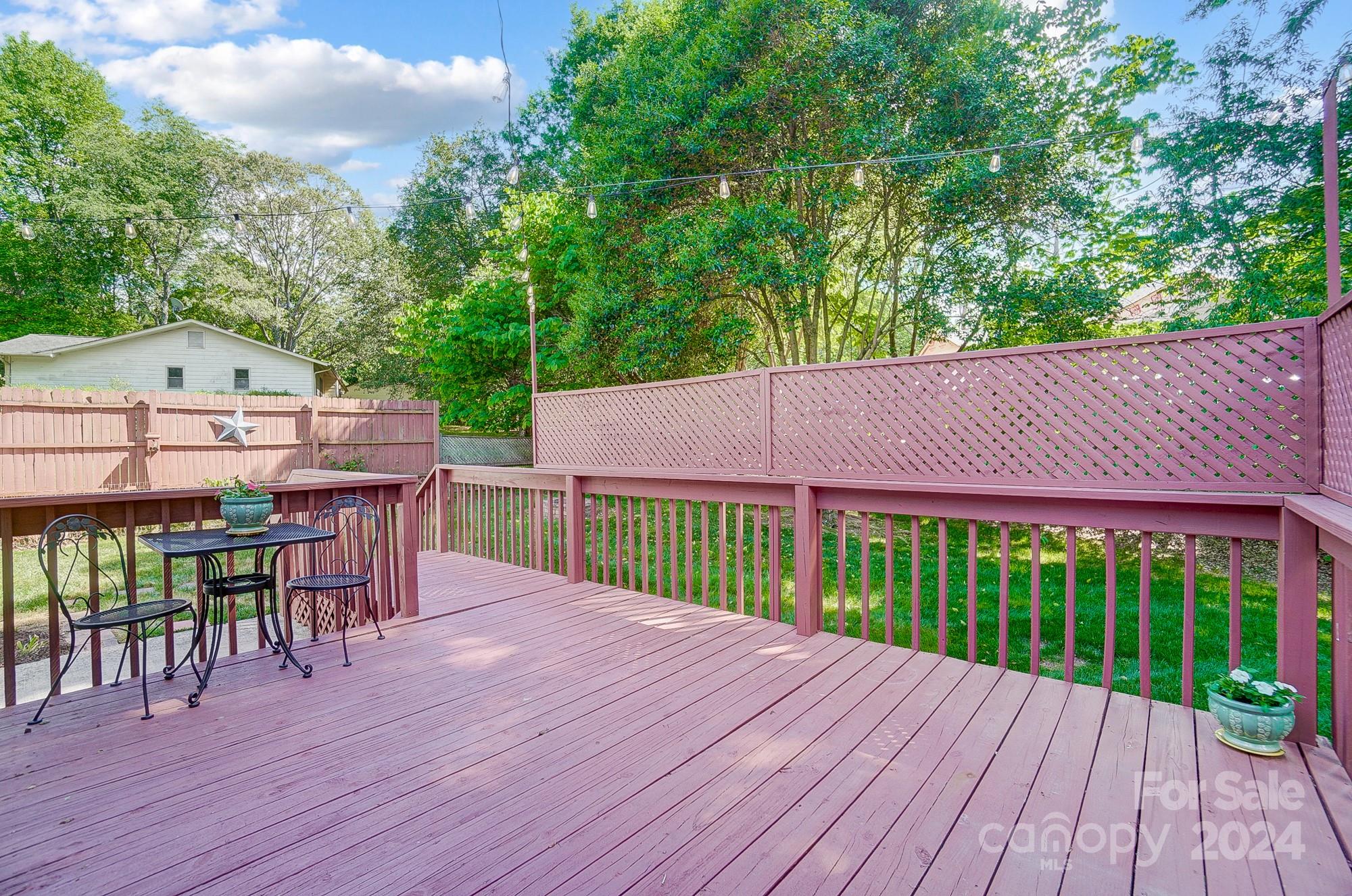 6510 Patchwork Circle Charlotte, NC 28270 - Photo 42 of 48 a view of a backyard with a deck and hardwood