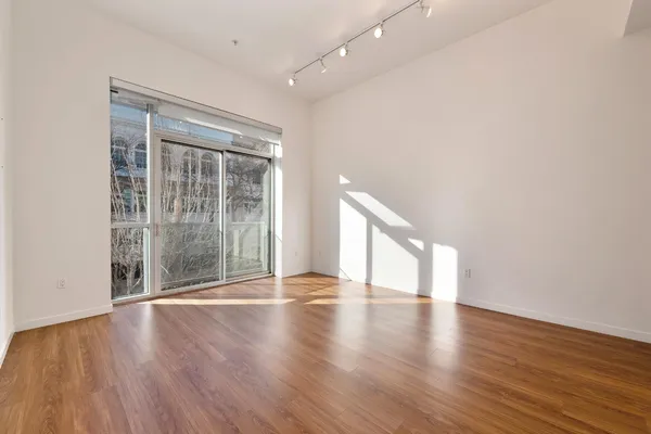 a view of empty room with windows