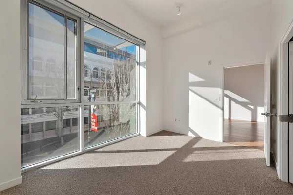 a view of a building with outdoor seating