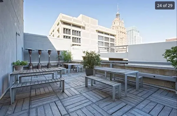 a view of a patio with potted plants