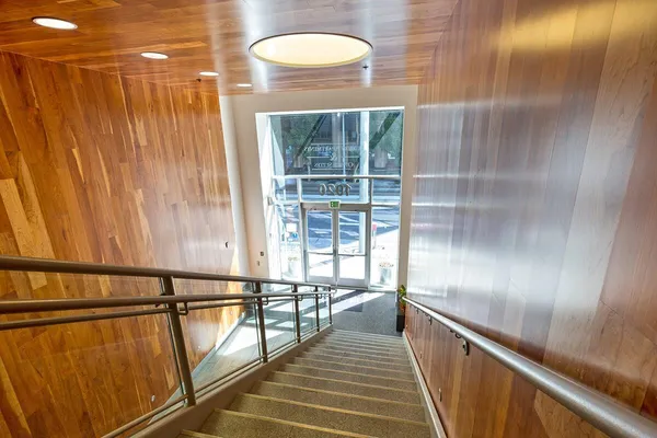 a view of a building with sitting area