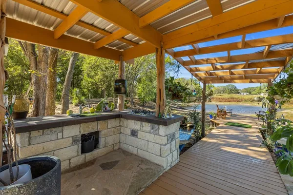 a view of a porch with seating space