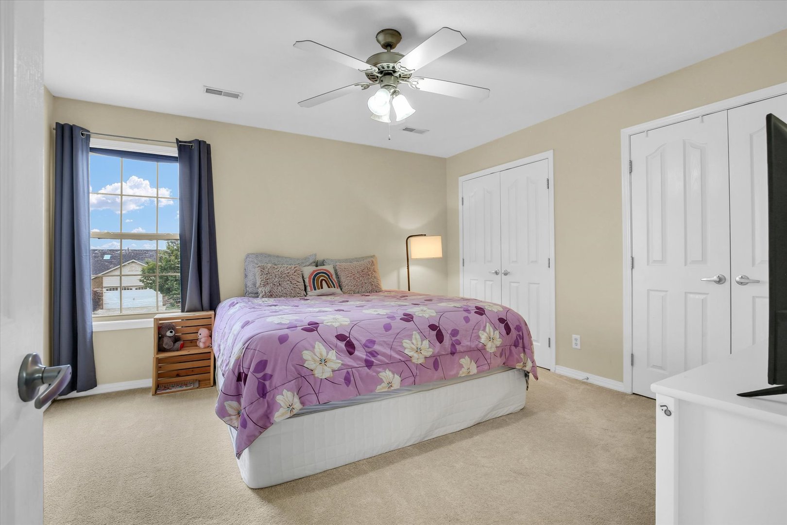 3715 Boulder Ridge Drive Champaign, IL 61822 - Photo 19 of 29 a bedroom with a bed and a chandelier