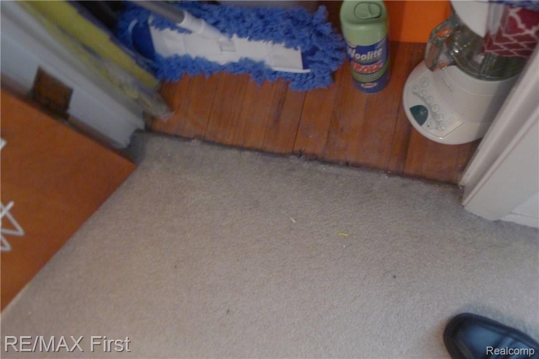 19411 Stephens Road Eastpointe, MI 48021 - Photo 31 of 48 Oak Hardwood Flooring underneath carpet.