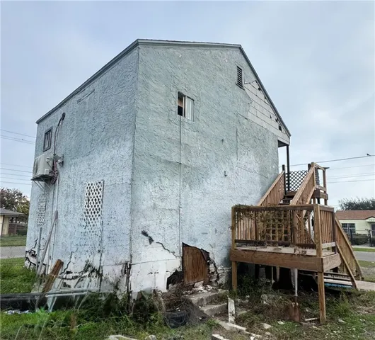 a view of roof deck with patio