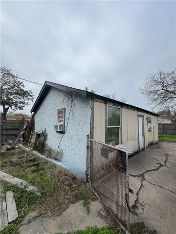 a house view with a backyard space