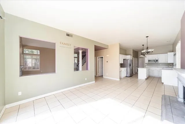 a view of a kitchen with a sink